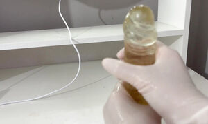 I Give A Handjob To The Dildo With Oily Hands In Medical White Gloves